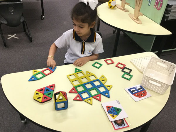 Viss primary pupil learning in classroom using shapes